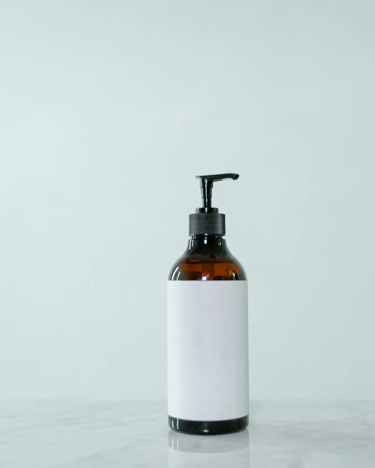 amber pump bottle of facial serum
