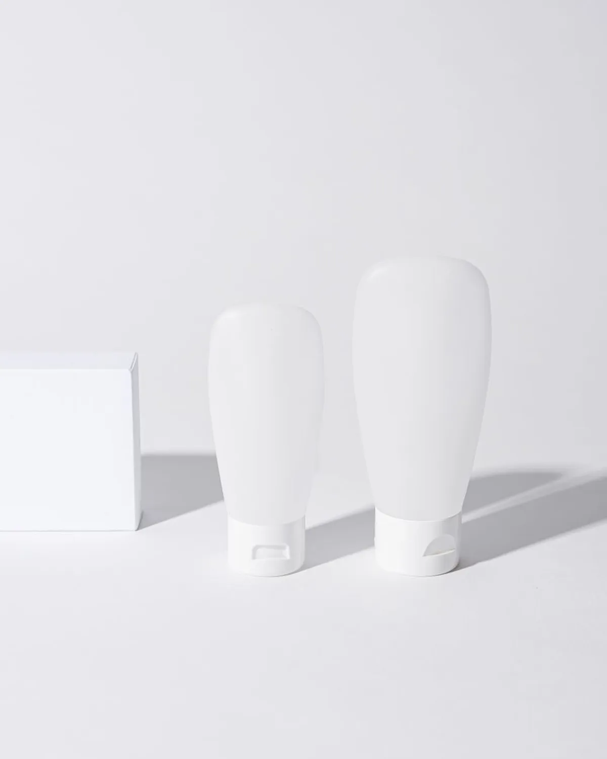 white squeeze tubes of daily facial sunscreen